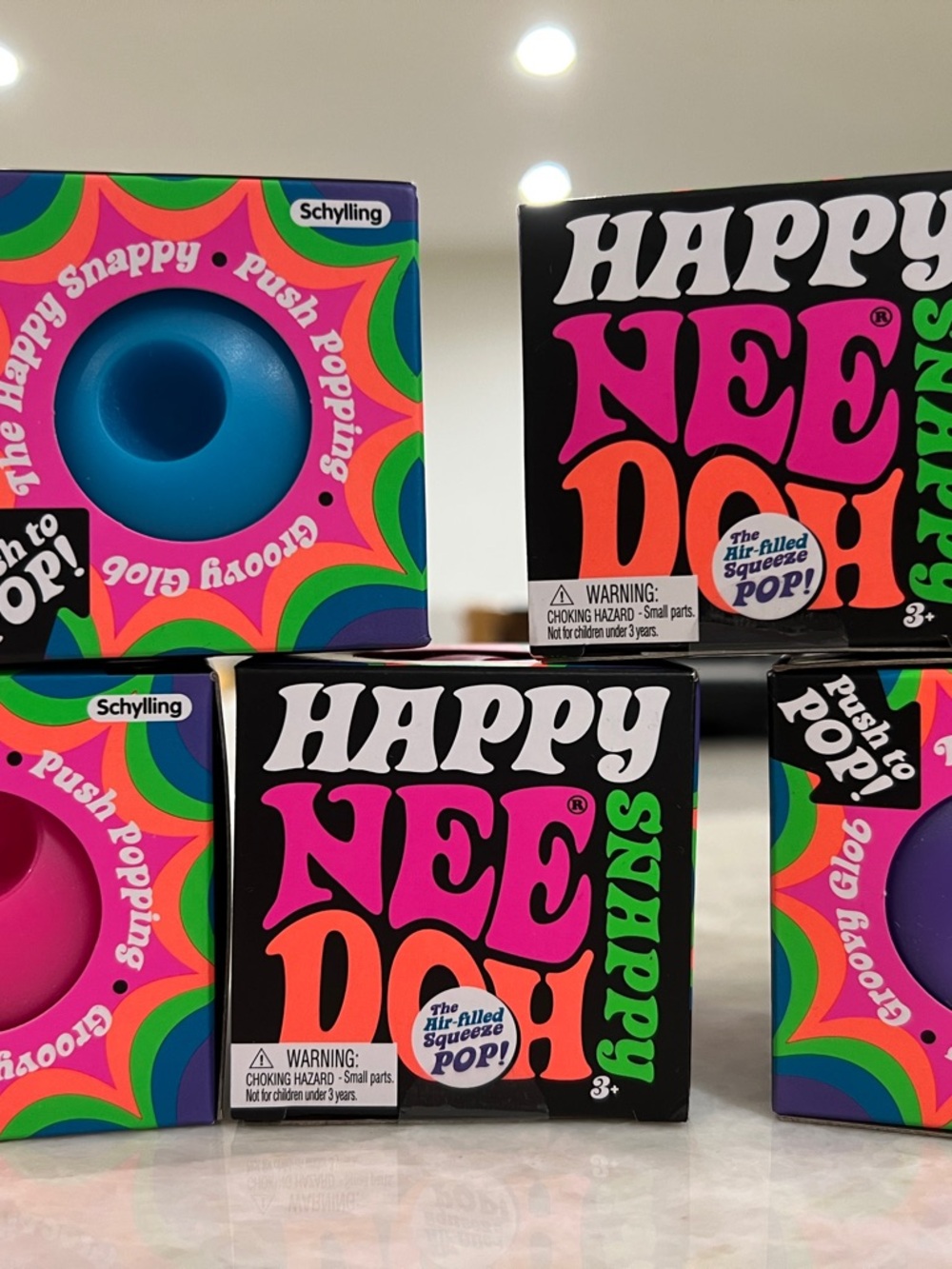 Snappy Needoh Squeeze Pop - Multicolor blue purple pink